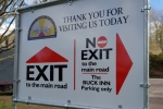 Main Gate Sign on Way Out
