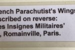Inscription on reverse of wings